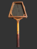 Vintage wooden tennis racket in excellent condition