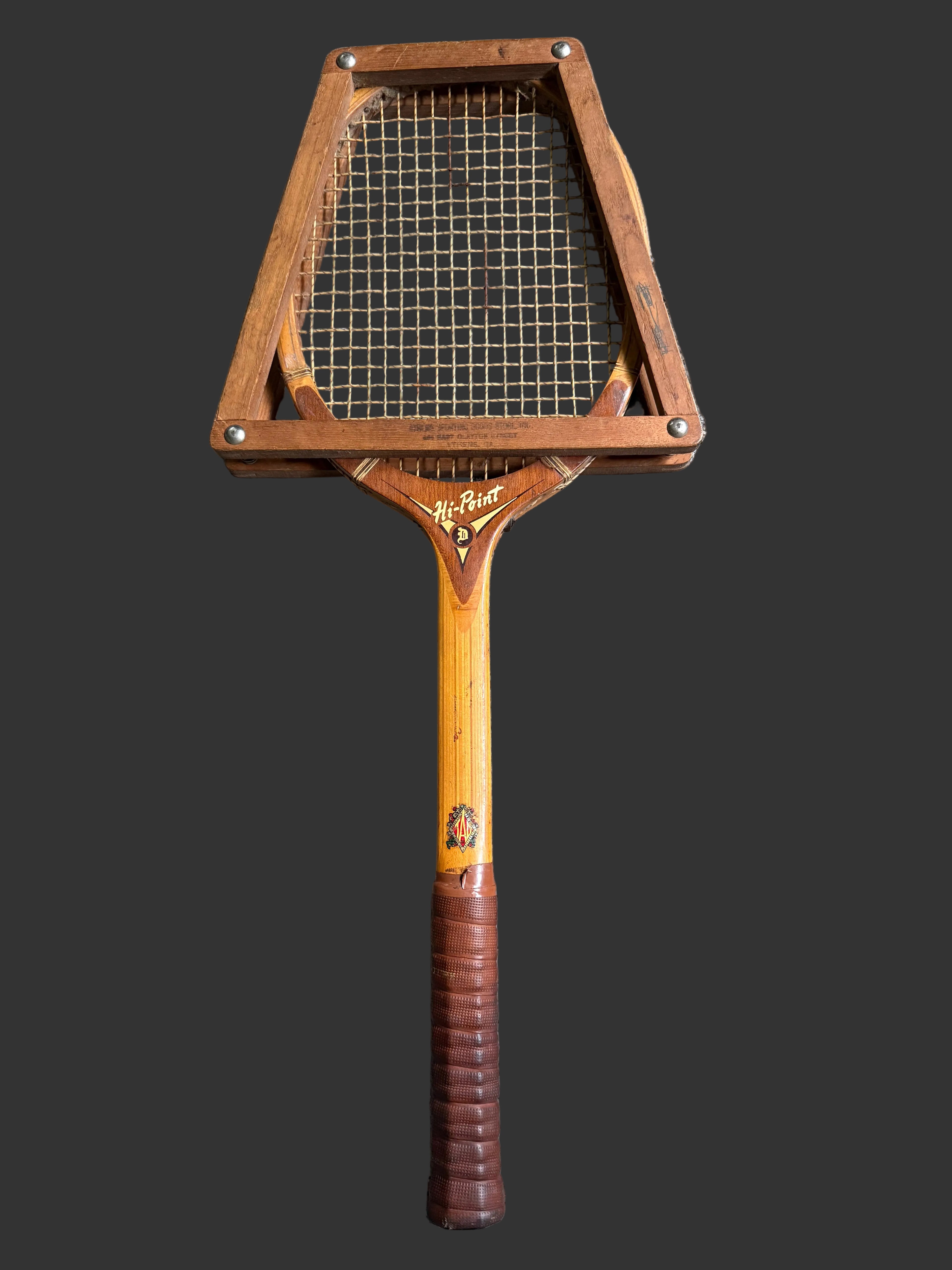 Vintage wooden tennis racket in excellent condition
