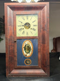Antique Ansonia Clock Company weight-and-spring mantle clock