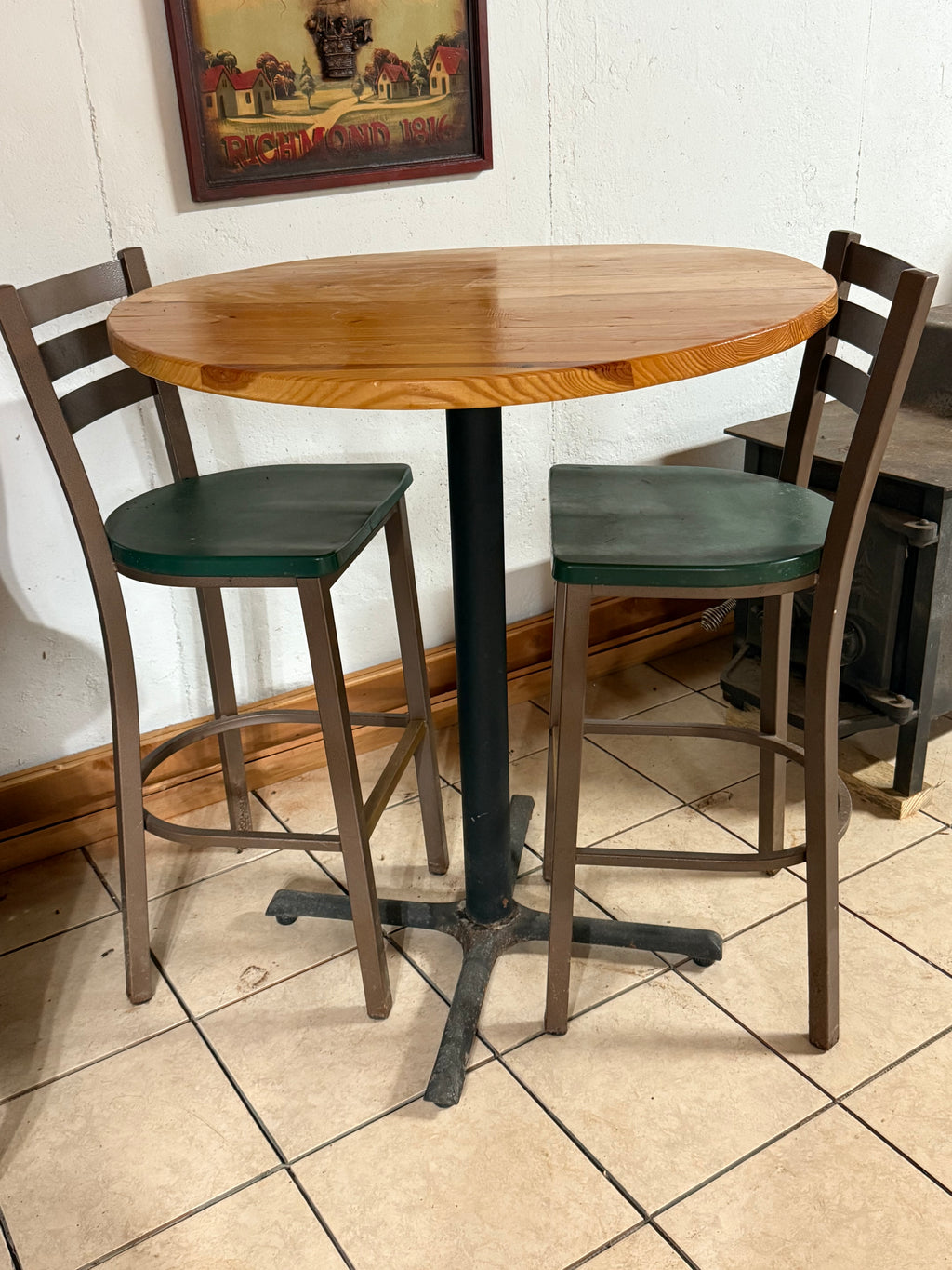 36-inch round Bristol high-top bar table with two matching chairs