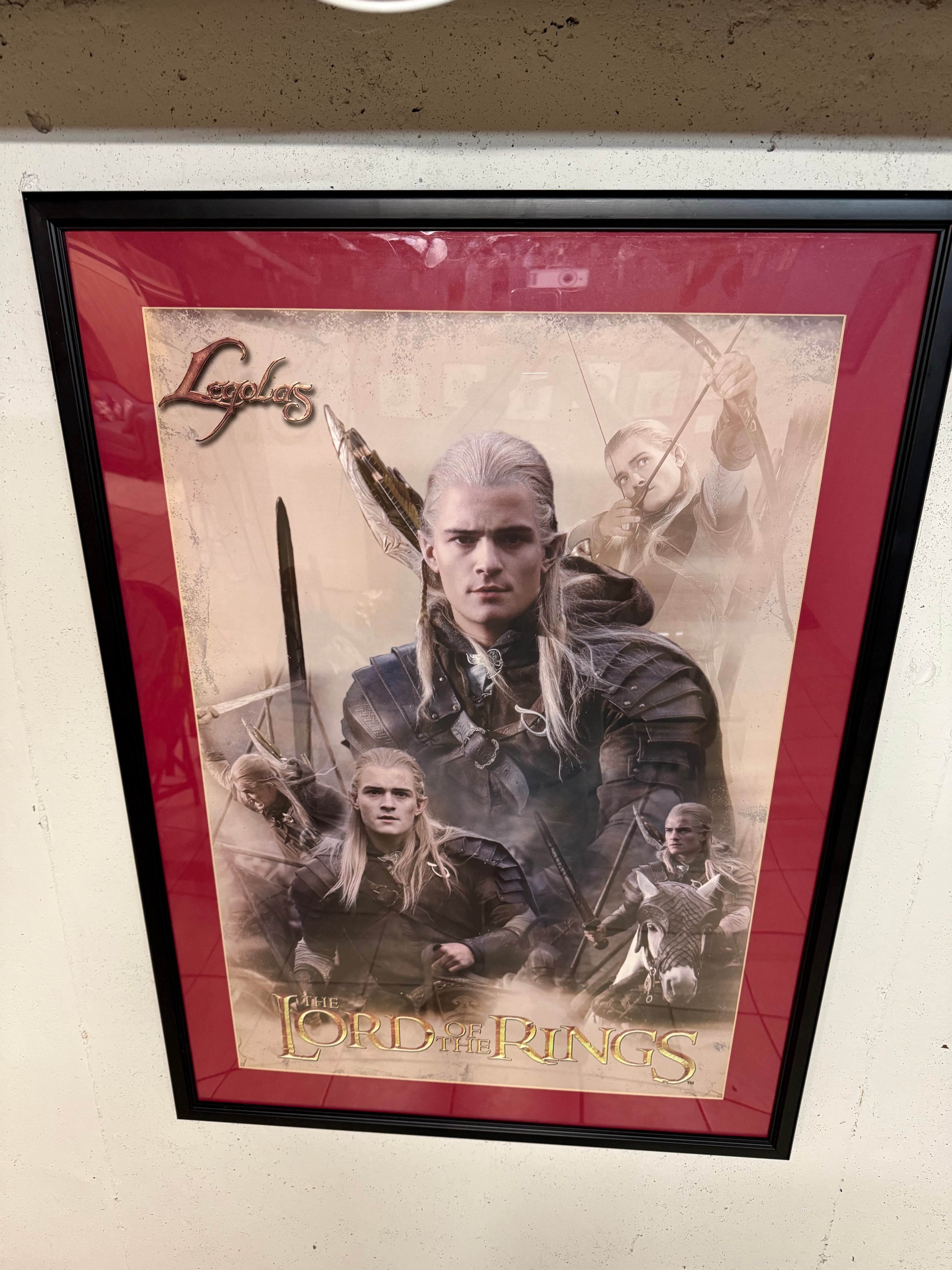 Lord of the Rings Legolas movie poster in black frame with red matting, 29 by 40 inches