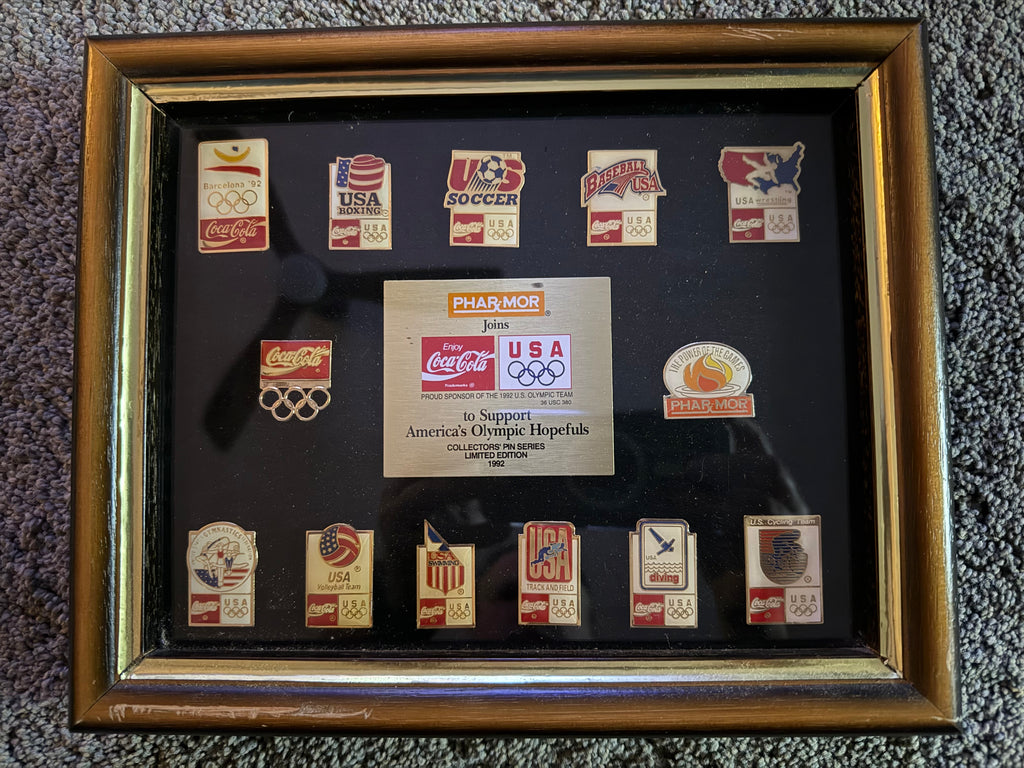 Framed 1992 Coca-Cola Olympic collectors pin series, limited edition display piece
