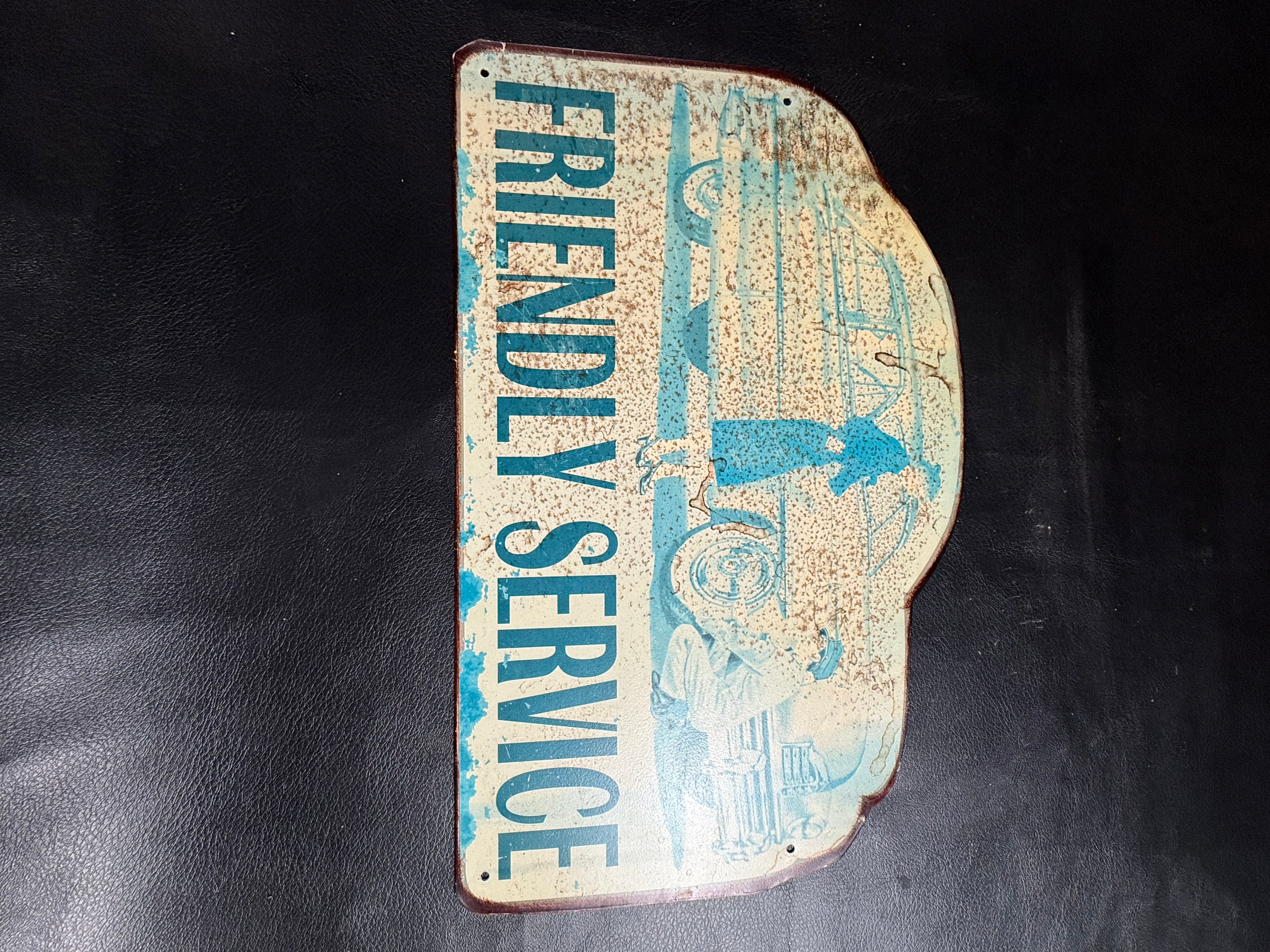 Heavy vintage Friendly Service metal sign, 16 by 10 inches